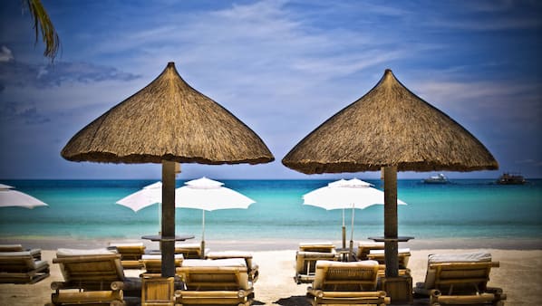 Private beach, white sand, sun-loungers, beach umbrellas