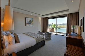 Premium Room (River View) | Minibar, in-room safe, individually decorated, individually furnished