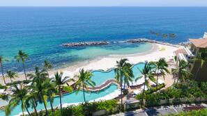 On the beach, sun loungers, beach umbrellas, beach towels