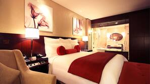 1 bedroom, hypo-allergenic bedding, down comforters, minibar