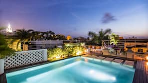 Indoor pool, outdoor pool, pool umbrellas, sun loungers
