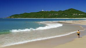 On the beach, white sand, beach towels