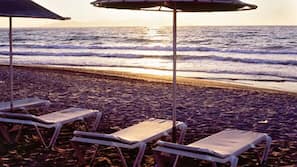 Private beach, sun loungers, beach umbrellas, beach towels