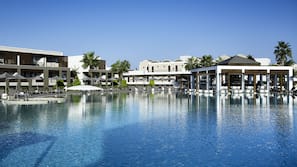 3 outdoor pools, cabanas (surcharge), pool umbrellas