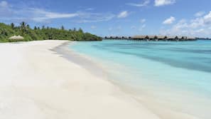 Private beach, white sand, sun-loungers, beach umbrellas