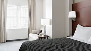 Premium bedding, desk, laptop workspace, free WiFi