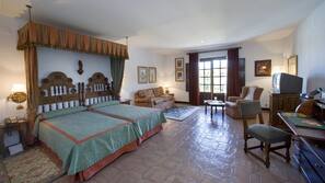 Ropa de cama de alta calidad, minibar, caja fuerte y escritorio