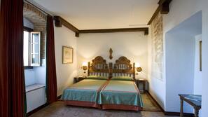 Ropa de cama de alta calidad, minibar, caja fuerte y escritorio