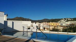 Outdoor pool, sun loungers