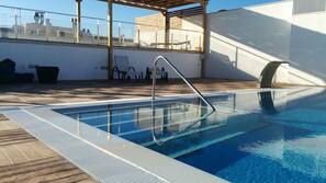 Outdoor pool, sun loungers