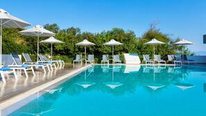 2 outdoor pools, pool umbrellas, pool loungers
