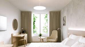 Hypo-allergenic bedding, down duvet, minibar, in-room safe