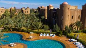 2 outdoor pools, open 7 AM to 9 PM, pool umbrellas, pool loungers