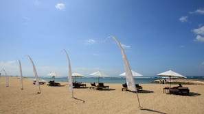 Private beach, white sand, sun-loungers, beach umbrellas