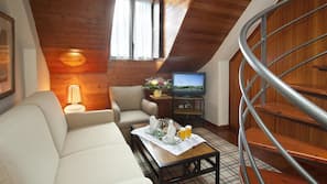 Ropa de cama de alta calidad, minibar, caja fuerte y escritorio