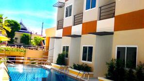 2 outdoor pools, pool umbrellas, pool loungers