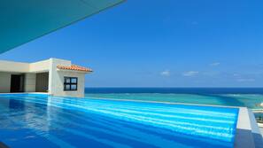 2 outdoor pools, open 8:30 AM to 6:00 PM, pool umbrellas