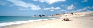 Private beach, white sand, free beach cabanas, sun loungers