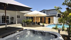 2 outdoor pools, open 8 AM to 10:00 PM, pool umbrellas, pool loungers