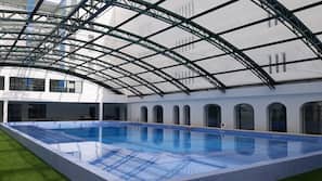 Indoor pool, open 8 AM to 8 PM, pool umbrellas, pool loungers