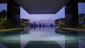 Outdoor pool, pool umbrellas, sun loungers