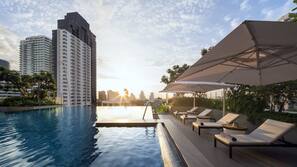 Outdoor pool, pool umbrellas, sun loungers