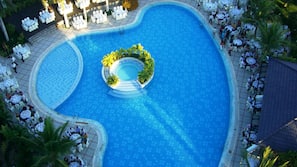 Outdoor pool, pool umbrellas, sun loungers
