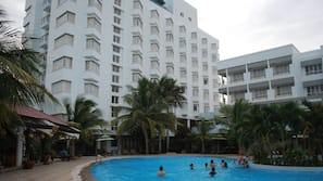 Outdoor pool, pool umbrellas, sun loungers