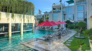 Outdoor pool, pool umbrellas, pool loungers