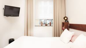 Luxe beddengoed, pillowtop-bedden, een kluis op de kamer