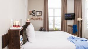 Luxe beddengoed, pillowtop-bedden, een kluis op de kamer