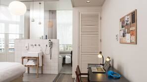 Luxe beddengoed, pillowtop-bedden, een kluis op de kamer