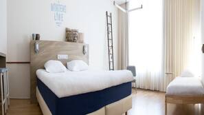 Luxe beddengoed, pillowtop-bedden, een kluis op de kamer