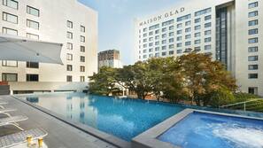 Seasonal outdoor pool, open 10 AM to 6:00 PM, pool umbrellas