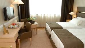 Luxe beddengoed, donzen dekbedden, een kluis op de kamer