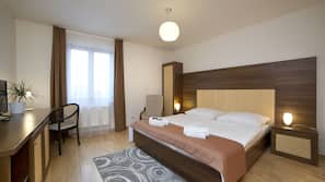 Hypo-allergenic bedding, minibar, desk, iron/ironing board