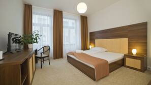 Hypo-allergenic bedding, minibar, desk, iron/ironing board