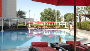 Outdoor pool, open 6 AM to 10 PM, pool umbrellas, pool loungers