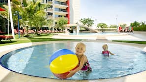 Outdoor pool, open 6 AM to 10 PM, pool umbrellas, pool loungers
