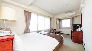 Down comforters, desk, blackout drapes, iron/ironing board