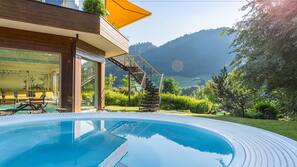Indoor pool, outdoor pool, pool umbrellas, sun loungers