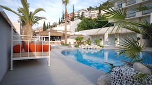 Outdoor pool, pool umbrellas, pool loungers