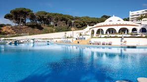 Indoor pool, outdoor pool, pool umbrellas, pool loungers