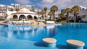 Indoor pool, outdoor pool, pool umbrellas, pool loungers
