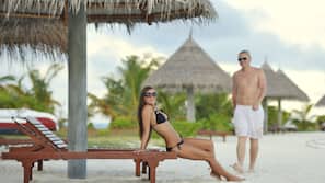 Private beach, white sand, free beach cabanas, sun loungers