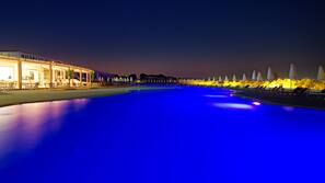 Indoor pool, open 7 AM to 7 PM, pool loungers