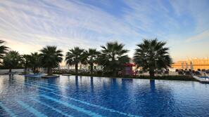 Outdoor pool, pool umbrellas, pool loungers