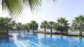 Outdoor pool, pool umbrellas, pool loungers