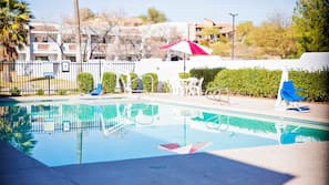 Outdoor pool, pool umbrellas, sun loungers