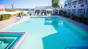 Outdoor pool, pool umbrellas, sun loungers